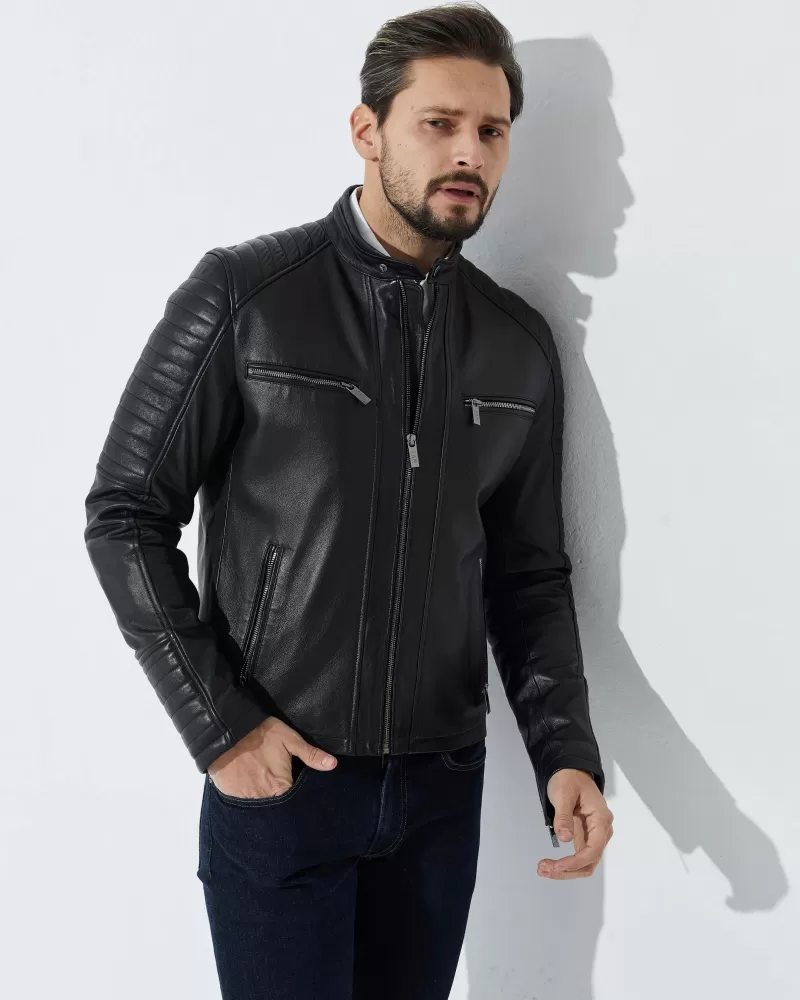 Black leather jacket with quilted sleeves and shoulders